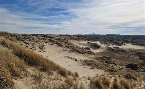 duinlandschap en villa's langs het strand