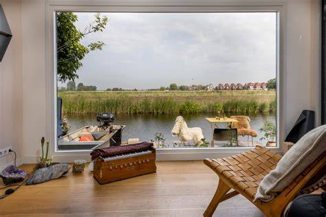 Loft aan het water met terras en open haard
